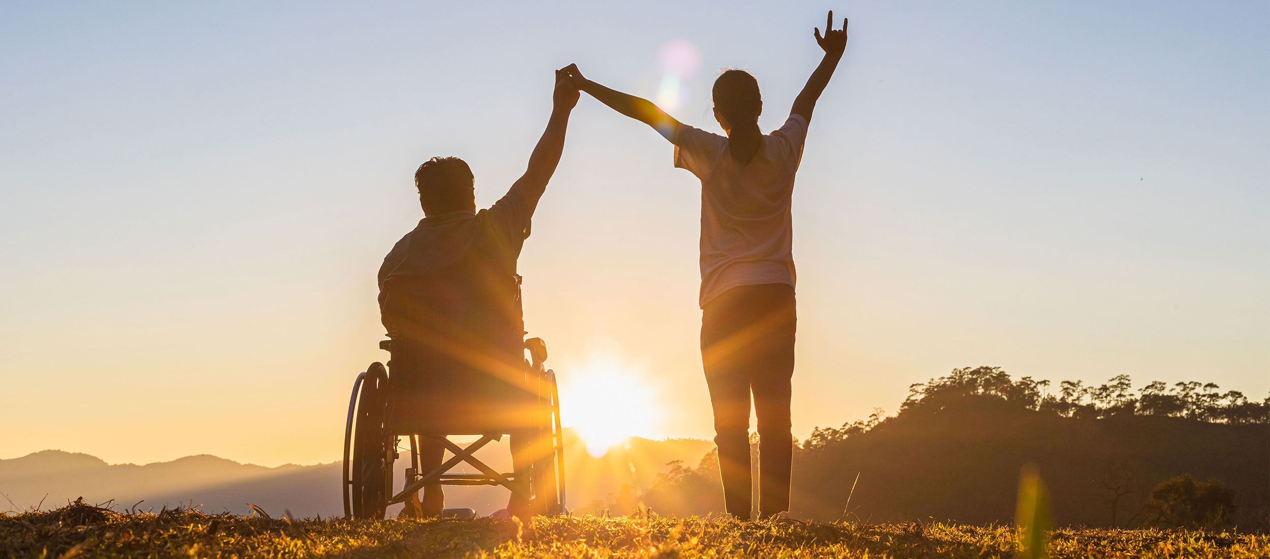 Couple enjoying a wheelchair accessible holiday